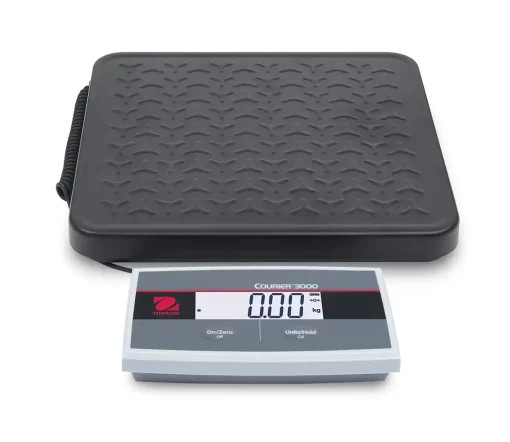 Small dog being weighed on COURIER 3000 veterinary scale
